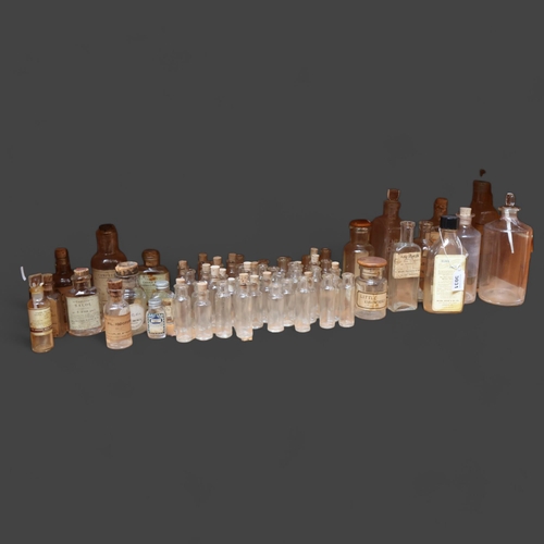 3031 - A large quantity of mixed clear glass apothecary bottles and test tube samplers, the majority are co... 