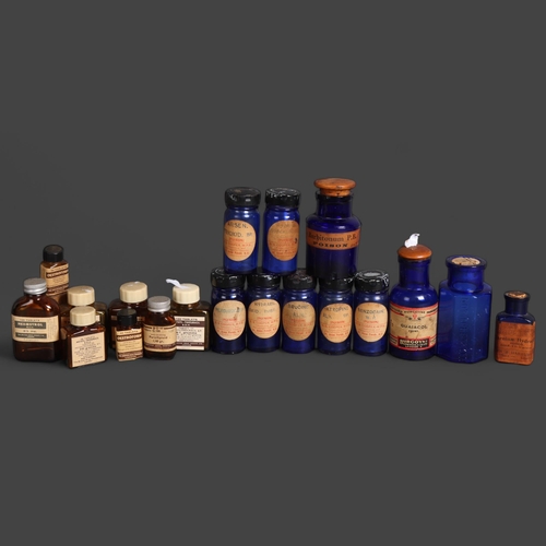 3035 - A collection of seven cobalt blue poison bottles with metal stoppers, all with labels relating to 'S... 