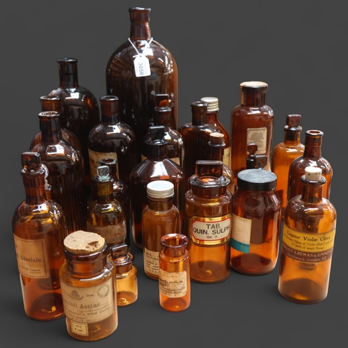 3056 - A large quantity of amber glass apothecary bottles, mixed sizes and styles, some stoppers present, s... 