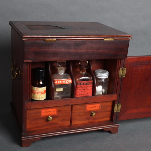 3060 - A George III mahogany travelling apothecary chest, having a hinged lid that reveals a fitted interio... 