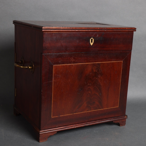 3060 - A George III mahogany travelling apothecary chest, having a hinged lid that reveals a fitted interio... 