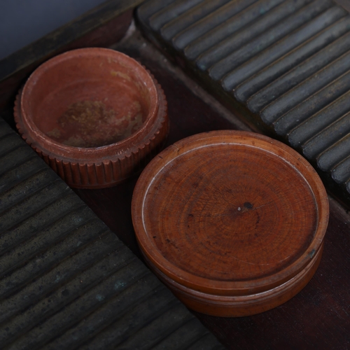 3066 - An antique apothecary pill roller, unmarked, with wooden dish and terracotta pot (missing lid).