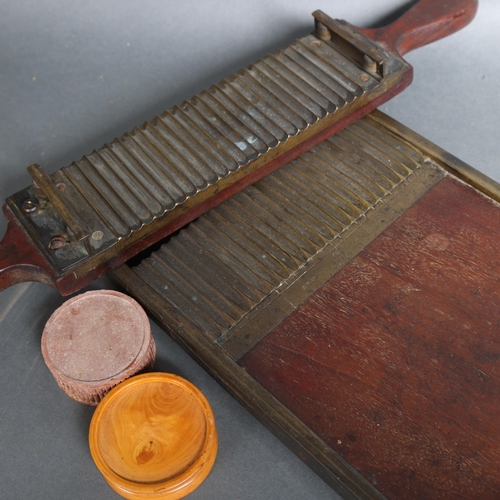 3067 - An antique apothecary pill roller, unmarked, with wooden dish and terracotta pot with lid.