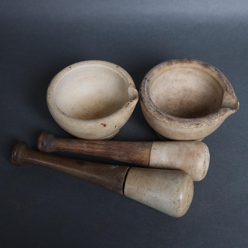 3069 - Two vintage pestle and mortar's, one impressed to base 'Best Composition', (2).