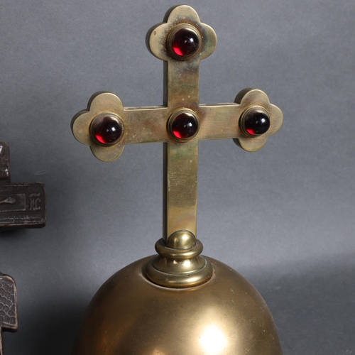 3104 - A brass religious altar cross set with red cabochon stones, height 26cm, a brass alms dish with hera... 