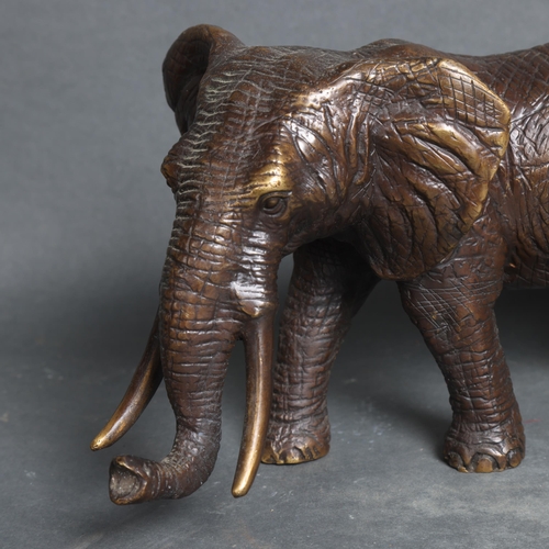 3117 - A bronze study of an African elephant, unsigned, height 17cm.