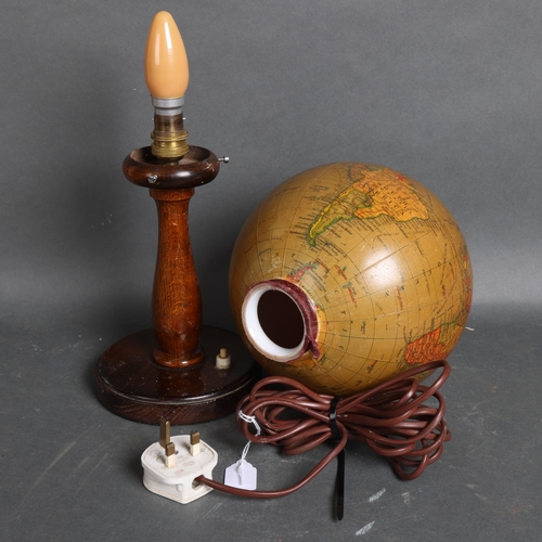 3124 - A 1920's 'Geographia', 8 inch, terrestrial revolving globe lamp on beechwood stand, height 42cm.