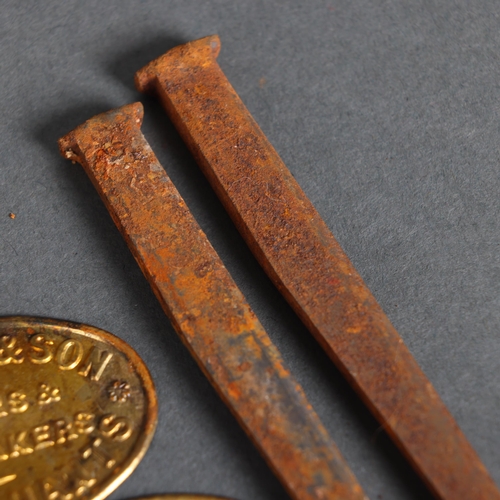 3167 - Pair of Undertaker Label Plaques and a pair of coffin nails. A pair of oval Edwardian gilt metal emb... 