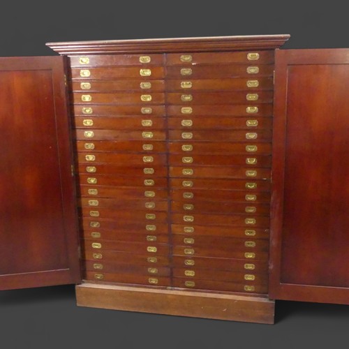 3000 - A fine Victorian mahogany floor standing specimen collectors cabinet, the fielded panelled cabinet d... 