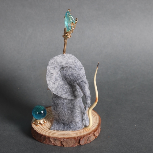 2999 - Taxidermy Wizard Mouse. An anthropomorphic full mount taxidermy mouse, mounted upright on a slice of... 