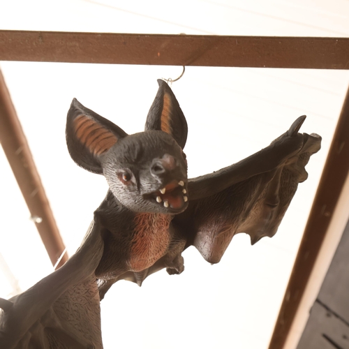 3362 - A large hanging vinyl model of a bat.