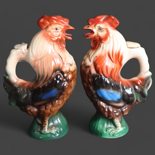 3394 - A pair of ceramic cockerel design ewers, makers marks to underside, hight 18cm, (2).