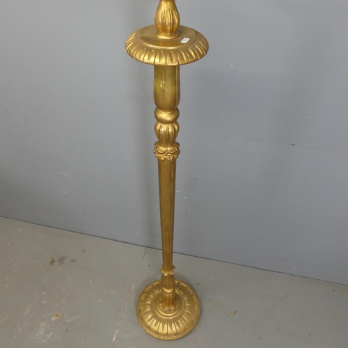 2708 - A fluted giltwood standard lamp, height to bayonet 160cm. For re-wiring.