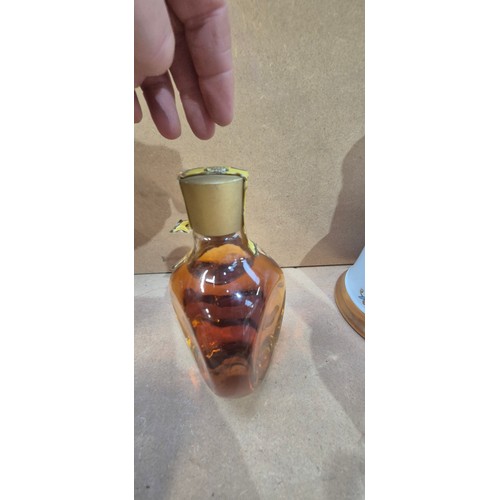 404 - A graduated set of 5 dimple bottles of Haig Scotch Whisky, largest one quart