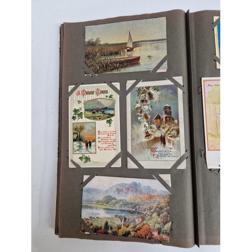 103 - 3 albums containing over 1000 Vintage postcards