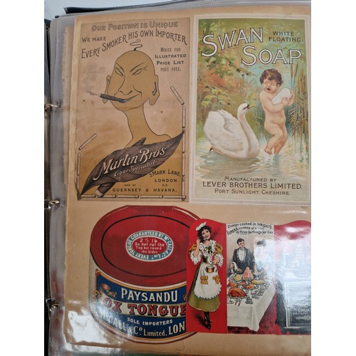 586 - An interesting album of Antique advertising packaging, magazine advertisements, cards, etc