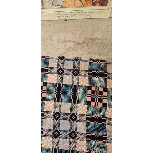 658 - A pink patterned reversible Welsh wool blanket, 208cm x 178cm (A/F)