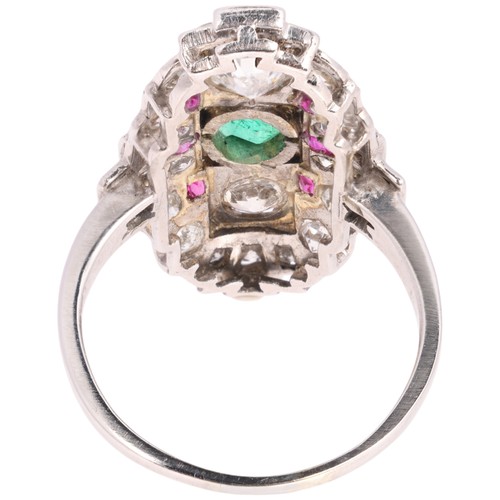 17 - An Art Deco Emerald Ruby and Diamond Plaque Ring, 

circa 1930, the stepped geometric plaque millegr... 