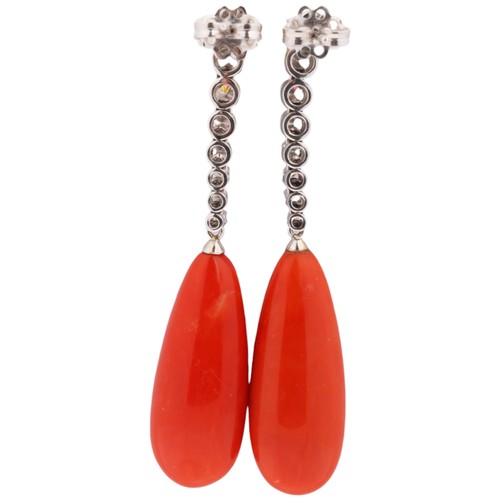 9 - A Pair of Coral and Diamond Drop Stud Earrings, 

the teardrop-shaped coral suspended from an articu... 