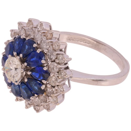 81 - A Sapphire and Diamond Cluster Ring, 

claw set with modern round brilliant-cut diamond of approxima... 