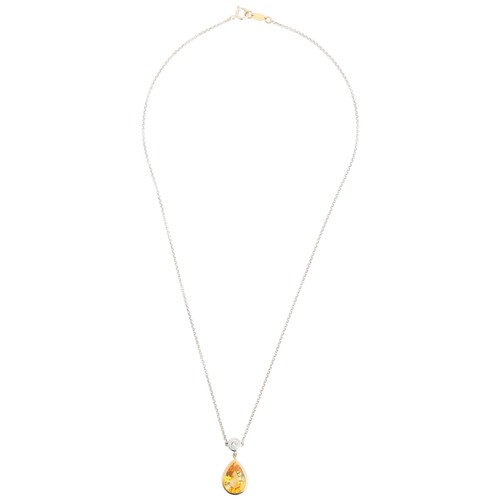 59 - A Yellow Sapphire and Diamond Pendant Necklace,

the teardrop pendant rub-over set with pear-cut yel... 