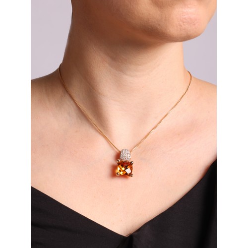 62 - A Citrine and Diamond Pendant Necklace,  

the drop pendant set with square barrel-cut citrine, susp... 