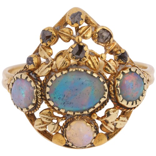 40 - ATTRIBUTED TO LIBERTY - An Art Nouveau Opal and Diamond Ring, 

circa 1900, the pear-shaped openwork... 