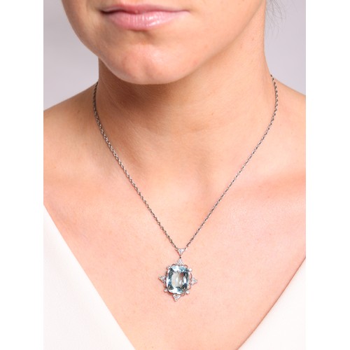 5 - An Aquamarine and Diamond Pendant Necklace,

set with an oval mixed cut aquamarine of approximately ... 