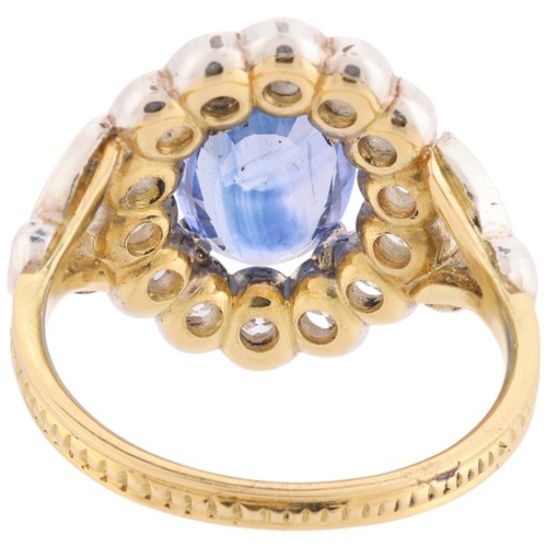 71 - A Sapphire and Diamond Cluster Ring,

the oval flowerhead cluster panel set with an oval mixed cut s... 