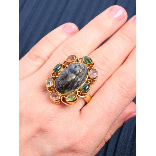 32 - A Labradorite and Gem-Set 'Scarab' Ring, 

set with a oval carved labradorite modelled as a scarab b... 