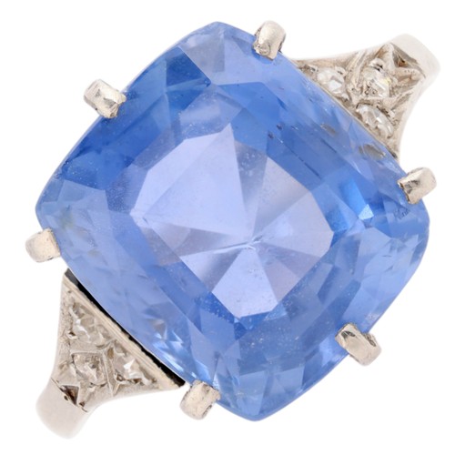 A Sri Lankan No Heat Sapphire and Diamond Ring,

circa 1910, claw set with a cushion cut sapphire of approximately 9.07 carats, flanked by single cut diamond chased shoulders, mounted in platinum, size N, 6g