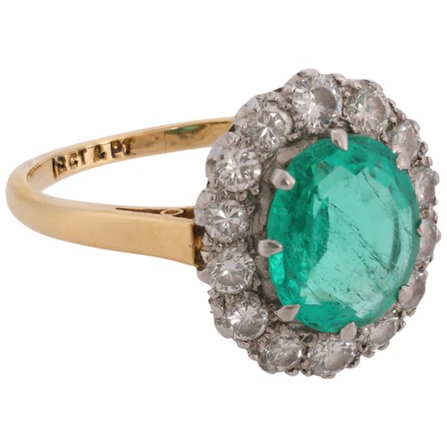 69 - An Emerald and Diamond Ring,

the oval cluster set with an oval mixed-cut emerald of approximately 1... 