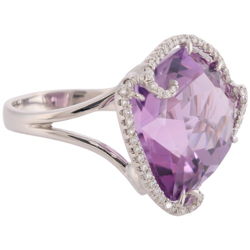 41 - An Amethyst and Diamond Ring,

set with a fantasy-cut amethyst of approximately 15.00 carats, surrou... 