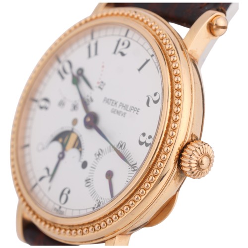 29 - PATEK PHILIPPE - A Fine 'Age of the Moon' Automatic Wristwatch,

ref. 5015, circa 1990s, white ename... 