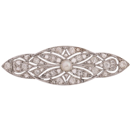 75 - An Art Deco Pearl and Diamond Brooch, 

circa 1930, the shaped marquise open-work panel centrally se... 