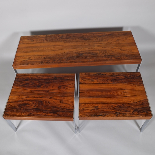 14 - RICHARD YOUNG for Merrow Associates, a nest of 3 rosewood coffee tables with chrome frame, largest t... 