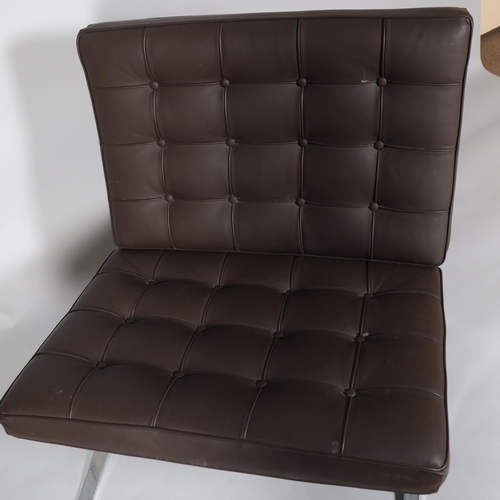 32 - A reproduction Barcelona Chair in faux brown leather and polished steel frame, height 78cm, width 78... 