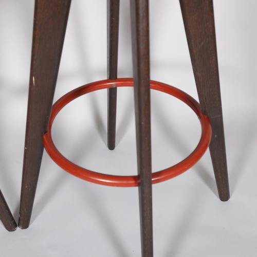 33 - JEAN PROUVE, a pair of Tabouret Hallway stained oak barstools by Vitra, height 78cm