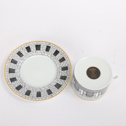 42 - Fornasetti for Rosenthal, a Palladiana pattern cup and saucer, makers marks to base, saucer diameter... 