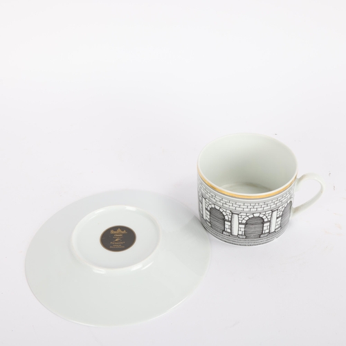 42 - Fornasetti for Rosenthal, a Palladiana pattern cup and saucer, makers marks to base, saucer diameter... 