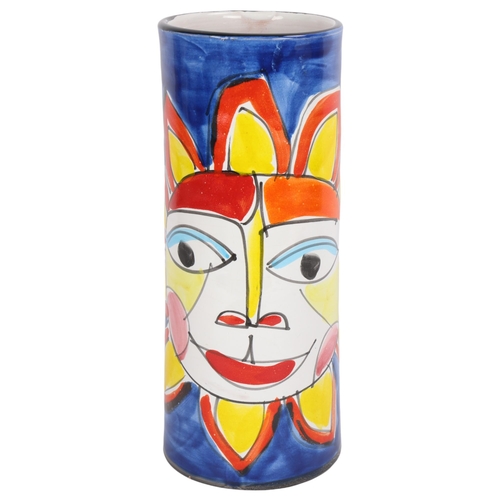 59 - La Musa, Italy, a large cylinder vase, blue glaze with large stylised sun/flower face, height 29cm