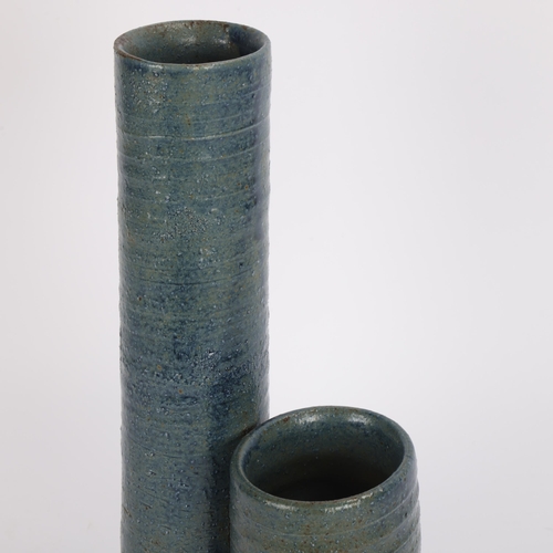 60 - A mid 20th century studio pottery vase, with two blueglazed joined vessels, makers mark to base