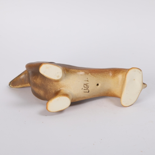 70 - LISA LARSON for Gustavsberg, a ceramic figurine of a “dashing” dashund from the second kennel series... 