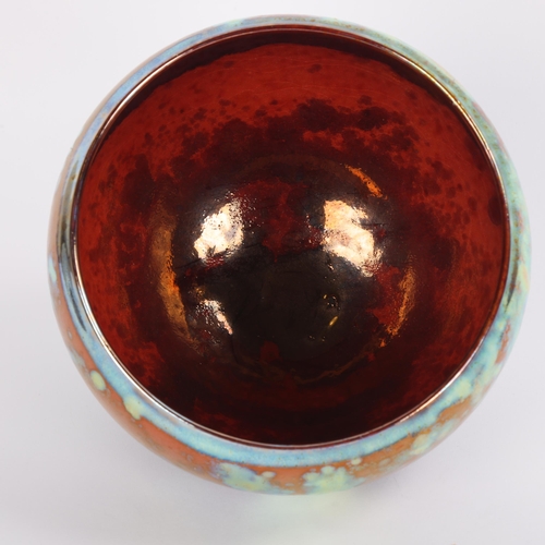 9 - SUTTON TAYLOR (b.1943), an earthenware studio pottery bowl, with lustre polychrome decoration, maker... 