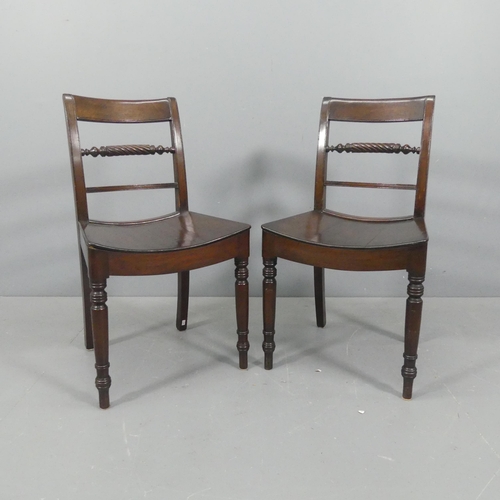 2117 - A pair of George III style mahogany dining chairs, with solid seats, turned front legs and rope twis... 