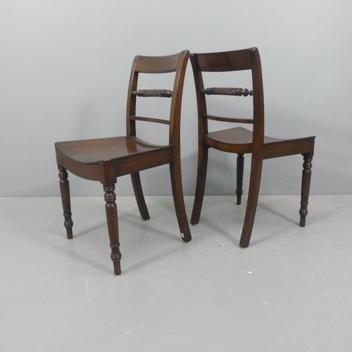 2117 - A pair of George III style mahogany dining chairs, with solid seats, turned front legs and rope twis... 