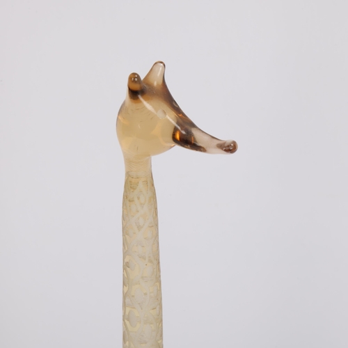 102 - VICKE LINDSTRAND for Kosta, a glass giraffe in yellow glass with a pale amber head and engraved gira... 