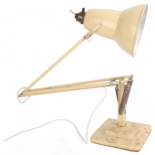 112 - A Vintage Herbert Terry cream anglepoise lamp, with two step base, makers mark to stem, height appro... 