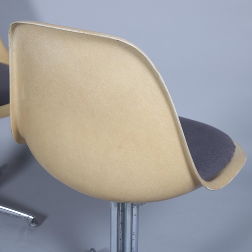 141 - CHARLES EAMES, a pair of Vitra fibre glass side chairs with upholstered seat and on rare La Fonda ba... 