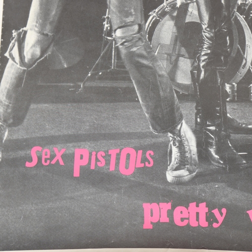 148 - Sex Pistols, publicity photo poster, Pretty Vacant 1977, depicting the band in concert, 60 x 79cm